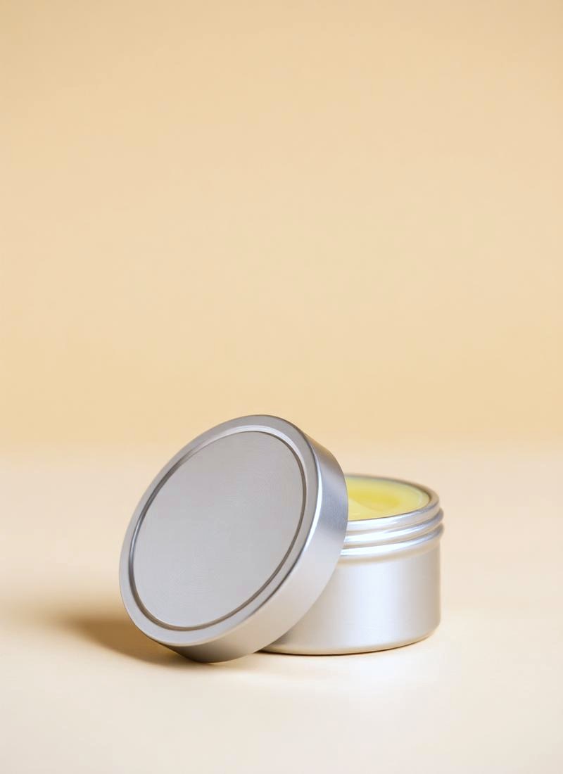 Beard Balm in an open metal tin