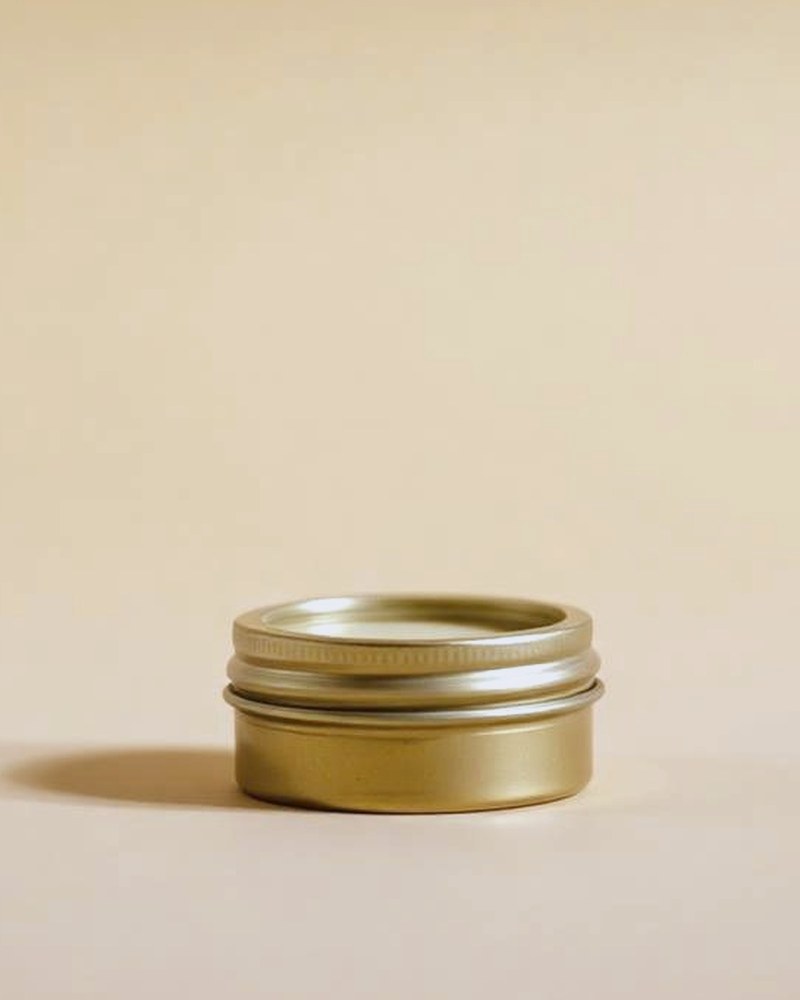 Mustache Wax in a small tin
